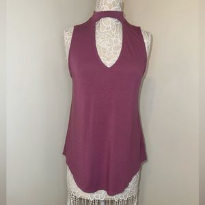 Raspberry colored cleavage keyhole tank top.